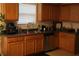 Functional kitchen with plenty of counter space, wooden cabinets, and modern appliances at 8871 Jimmy Lee Cir, Jonesboro, GA 30238