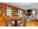 Inviting living room featuring hardwood floors, built-in bookshelves, and a cozy fireplace at 2783 Mount Olive Dr, Decatur, GA 30033