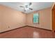 A well lit bedroom features hardwood floors and a window at 488 Russell Rd, Lawrenceville, GA 30043