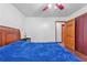 A well lit room features hardwood floors and a ceiling fan/light combination at 488 Russell Rd, Lawrenceville, GA 30043