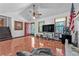 Bright living room with tile floors, ceiling fan, fireplace, and natural light at 488 Russell Rd, Lawrenceville, GA 30043