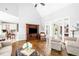Spacious living room with hardwood floors, neutral colors, and an open floor plan at 674 Owl Creek Ct, Powder Springs, GA 30127