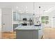 Bright kitchen with updated cabinets, marble countertops and stainless steel appliances at 7020 Grand View Way, Suwanee, GA 30024