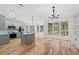 Bright kitchen with updated cabinets, stainless steel appliances and eat-in area at 7020 Grand View Way, Suwanee, GA 30024