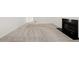 Bright living room featuring plush carpet and a fireplace with a black hearth at 7020 Grand View Way, Suwanee, GA 30024