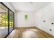 Bonus room with sliding glass door and wood floors, perfect for extra living space at 2019 Emerald Dr, Jonesboro, GA 30236