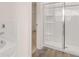 Bathroom features a soaking tub and a glass shower at 349 Elgin Dr, Lawrenceville, GA 30045