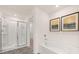 Modern bathroom features a glass shower and soaking tub at 349 Elgin Dr, Lawrenceville, GA 30045