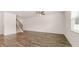 Inviting living room features wood-look floors and a stairway to the second floor at 349 Elgin Dr, Lawrenceville, GA 30045