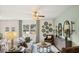 Bright living room with large window, stylish decor, and comfortable seating arrangement at 349 Elgin Dr, Lawrenceville, GA 30045
