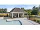 A community pool with an adjacent cabana offers residents a place for relaxation and fun at 349 Elgin Dr, Lawrenceville, GA 30045