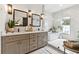 A luxurious bathroom boasts dual sinks, quartz countertops, and a glass-enclosed shower at 3667 Peachtree Ne Rd # 6, Atlanta, GA 30319