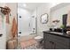 Modern bathroom featuring a sleek vanity, tiled shower with glass door, and contemporary fixtures for a luxurious feel at 3667 Peachtree Ne Rd # 6, Atlanta, GA 30319