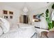 Serene bedroom boasting a plush bed, decorative lighting, and indoor plants for a relaxing and stylish retreat at 3667 Peachtree Ne Rd # 6, Atlanta, GA 30319