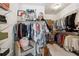 Spacious walk-in closet with ample shelving and hanging space for wardrobe organization at 3667 Peachtree Ne Rd # 6, Atlanta, GA 30319