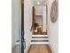 Inviting entryway with decorative accents and natural light leading to the upper level of the home at 3667 Peachtree Ne Rd # 6, Atlanta, GA 30319