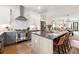 Open kitchen with stainless appliances, a center island, and easy access to the dining area and living room at 3667 Peachtree Ne Rd # 6, Atlanta, GA 30319