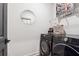 Convenient laundry room equipped with modern, front-load washer and dryer at 3667 Peachtree Ne Rd # 6, Atlanta, GA 30319