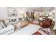 Bright and open living space featuring a modern sofa and a beautiful view of the dining area at 3667 Peachtree Ne Rd # 6, Atlanta, GA 30319