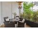 Cozy outdoor patio with comfortable seating, stylish lighting, and lush greenery creating a private and inviting space at 3667 Peachtree Ne Rd # 6, Atlanta, GA 30319