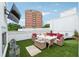 Inviting rooftop patio featuring comfortable seating, a television, and city views for outdoor entertainment at 3667 Peachtree Ne Rd # 6, Atlanta, GA 30319