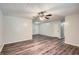 Open living space with modern flooring and a neutral color palette at 7112 Greenway Sw Cv, Covington, GA 30014
