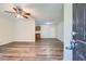 Open-concept living area featuring new flooring and neutral paint at 7112 Greenway Sw Cv, Covington, GA 30014