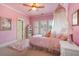 Pink bedroom with window, fluffy carpet and princess decor at 8715 Islesworth Ct, Duluth, GA 30097