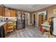 Compact kitchen features lots of upper and lower cabinets, laminate floor, and stainless appliances at 151 Grandma Branch Rd, Grantville, GA 30220