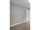 Bedroom featuring carpet flooring, a neutral gray paint, and white base boards at 1528 Alder Sw Ln, Atlanta, GA 30311