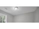 Bedroom featuring a window and neutral paint color at 1528 Alder Sw Ln, Atlanta, GA 30311