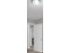 Hallway with a recessed lighting and multiple doors at 1528 Alder Sw Ln, Atlanta, GA 30311