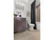 Bathroom with tiled floor, shower-bath combo, and vanity cabinet at 1628 Baytree Dr, Cumming, GA 30040