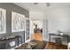 Office featuring french doors and views into the dining room and light hardwood flooring at 1628 Baytree Dr, Cumming, GA 30040