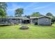 Large backyard with a trampoline, fire pit and gazebo at 205 Tamea Trl, Covington, GA 30014