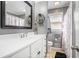 Bathroom with vanity, mirror, toilet and a shower/tub combo with pink shower curtain at 205 Tamea Trl, Covington, GA 30014