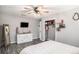 Spacious bedroom with a dresser, walk-in closet, and a view of the backyard at 205 Tamea Trl, Covington, GA 30014