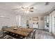 Inviting dining area with a rustic table, decorative accents, and a view of the outdoor space at 205 Tamea Trl, Covington, GA 30014