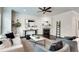 Bright living room features a cozy fireplace, modern decor, and hardwood flooring at 4905 Greylock Se Walk, Atlanta, GA 30339