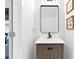 Bathroom featuring a vanity, modern mirror, and decor at 1671 Laurel Nw Ave, Atlanta, GA 30318