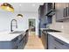 Modern kitchen features stainless steel appliances and an island at 1671 Laurel Nw Ave, Atlanta, GA 30318