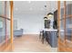 Open kitchen with a center island, pendant lighting, and hardwood floors at 1671 Laurel Nw Ave, Atlanta, GA 30318