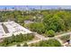 Aerial view of neighborhood showing trees and the city skyline in the distance at 175 Stovall Se St, Atlanta, GA 30316