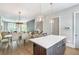 Modern kitchen with an island, stainless steel appliances, and hardwood floors at 175 Stovall Se St, Atlanta, GA 30316