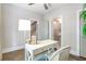 Bright home office featuring a desk, chair, large window, and neutral decor at 175 Stovall Se St, Atlanta, GA 30316