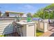 Outdoor kitchen features stainless steel grill, sink, granite countertops and seating for three at 175 Stovall Se St, Atlanta, GA 30316