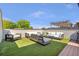 Luxurious roof deck featuring artificial grass, outdoor seating, and a shaded pergola at 175 Stovall Se St, Atlanta, GA 30316