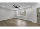 Bright living room featuring recessed lighting, ceiling fan, new floors, and fresh neutral paint at 2017 Allwood Ct, Lawrenceville, GA 30044
