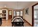 Modern kitchen with stainless steel appliances, island with seating and wood floors at 2130 Monticello Pl, Lawrenceville, GA 30043