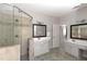 Bathroom featuring double sinks with a glass enclosed shower at 630 Bluff Oak Ct, Roswell, GA 30076